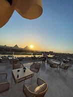 Pyramids sun temple view Inn
