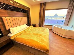 Pyramids sun temple view Inn