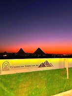 Pyramids sun temple view Inn