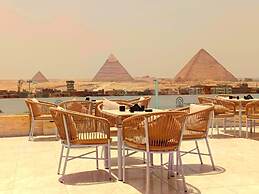 Pyramids sun temple view Inn