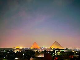 Pyramids sun temple view Inn