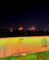 Pyramids sun temple view Inn