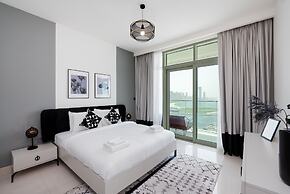 Elegant 2BR Emaar Beachfront Retreat