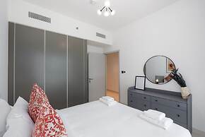 Elegant 2BR Emaar Beachfront Retreat