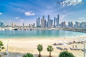 Elegant 2BR Emaar Beachfront Retreat