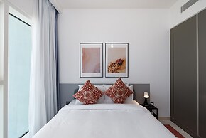 Elegant 2BR Emaar Beachfront Retreat