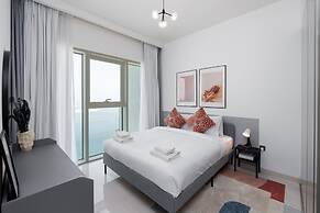 Elegant 2BR Emaar Beachfront Retreat