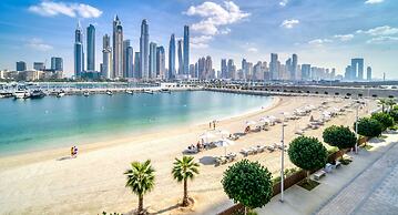 Elegant 2BR Emaar Beachfront Retreat