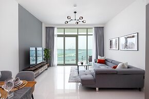 Elegant 2BR Emaar Beachfront Retreat