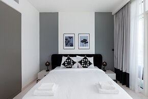 Elegant 2BR Emaar Beachfront Retreat