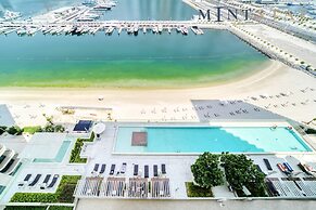 Elegant 2BR Emaar Beachfront Retreat