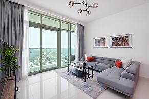 Elegant 2BR Emaar Beachfront Retreat