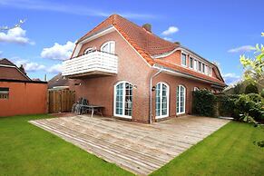 Ferienhaus in Dornum mit Garten