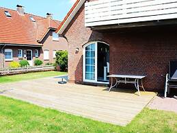 Ferienhaus in Dornum mit Garten