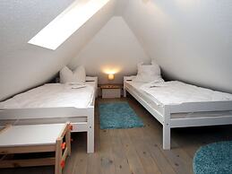 Ferienhaus in Dornum mit Garten