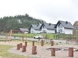 Cottage by Kiedrowickie Lake With Boat Access