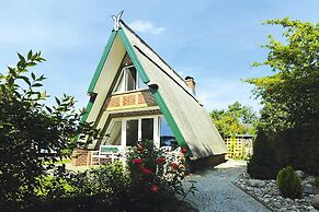 Thatched Holiday Home in Freest With Terrace