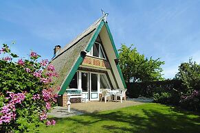Thatched Holiday Home in Freest With Terrace
