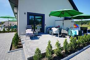 Spacious Holiday Home With a Terrace, Mielenko