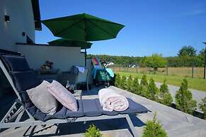 Spacious Holiday Home With a Terrace, Mielenko