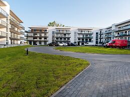 Apartment by Dziwna River With Pool Access