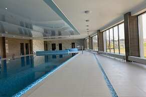 Apartment by Dziwna River With Pool Access