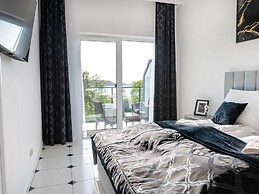 Apartment by Dziwna River With Pool Access