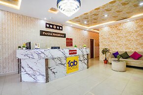 FabHotel Partha Residency