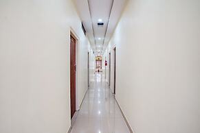 FabHotel Partha Residency