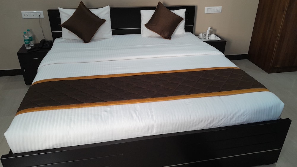 the Nisarga Grand   boarding & lodging