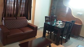 the Nisarga Grand   boarding & lodging