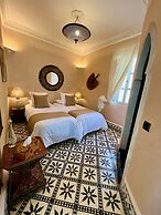 RIAD MALAÏKA