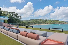 Gorgeous Beach House Perched Right Over the Ocean