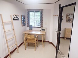 The Reef Hotel & Studios