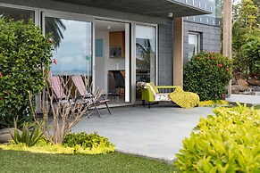 Cable Bay Stays – Golden Sand and Driftwood Beachfront Accommodation