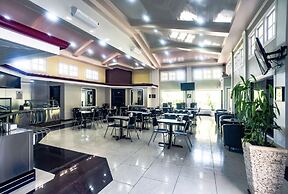 Prado Inn & Suites