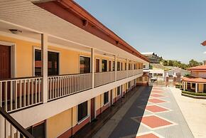 Prado Inn & Suites