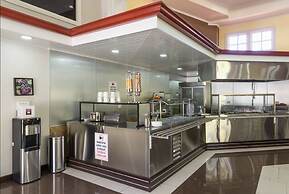 Prado Inn & Suites