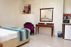 Atam Suites & Apart