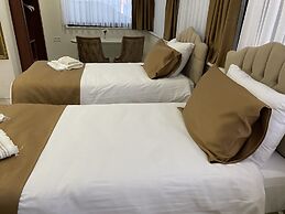 Atam Suites & Apart