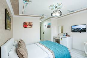 Atam Suites & Apart