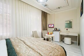 Atam Suites & Apart