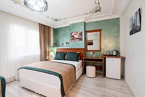 Atam Suites & Apart