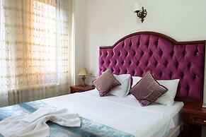 Atam Suites & Apart