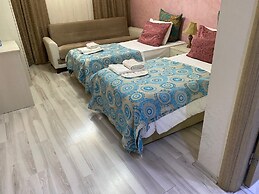 Atam Suites & Apart