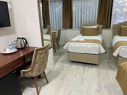 Atam Suites & Apart