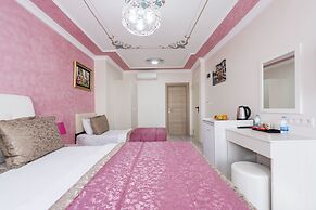 Atam Suites & Apart
