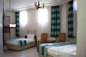 Atam Suites & Apart