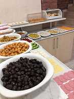 Atam Suites & Apart
