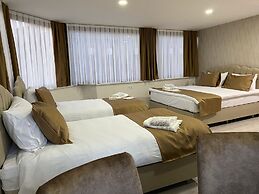 Atam Suites & Apart